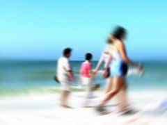 Family on the Beach in Summer