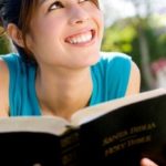 Teen girl holding Bible