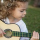 Little Girl playing guitar