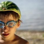 Boy with watermelon helmet