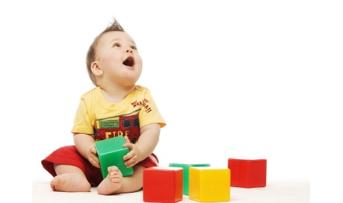 Baby Playing with colorful blocks