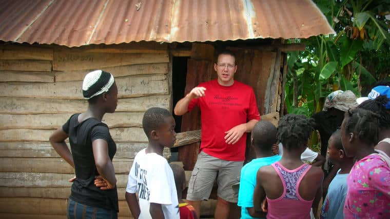 Tony Kummer talking to a group of young people in Haiti